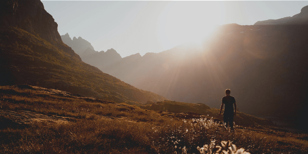 man walking in the mountains
