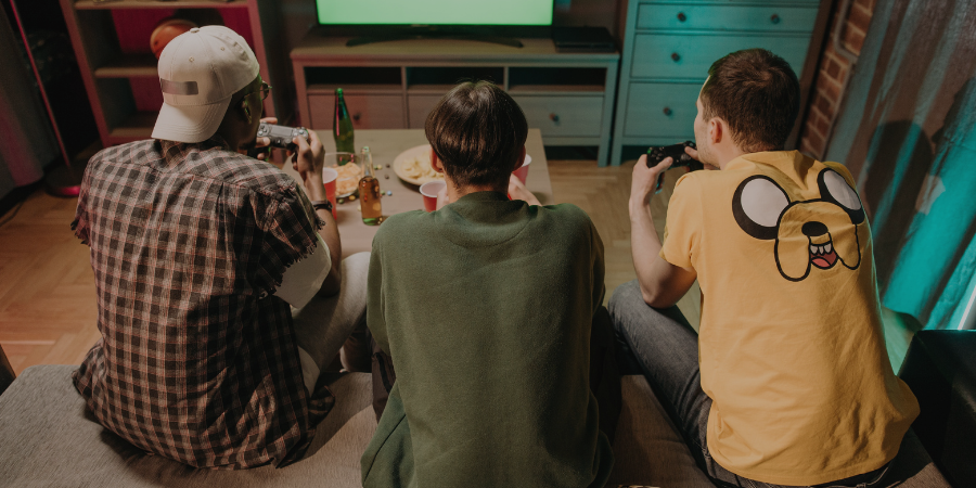 young men playing video games