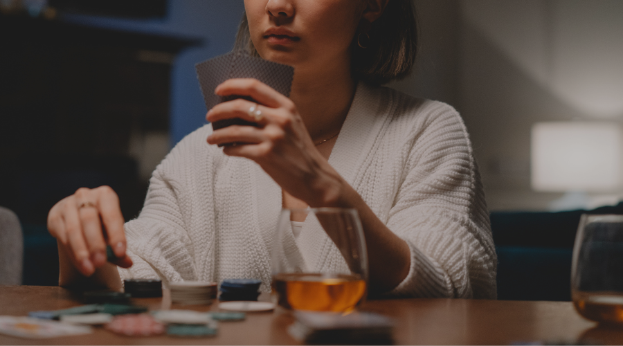 young woman playing poker